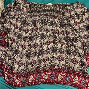 A fancy woman’s off the shoulder blouse